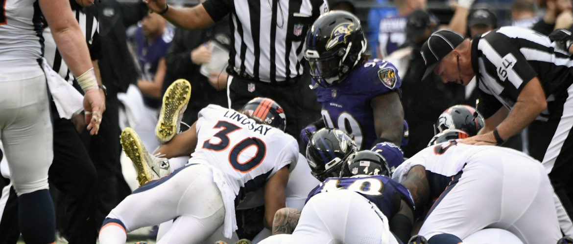 Penalties doom Broncos in loss against Baltimore